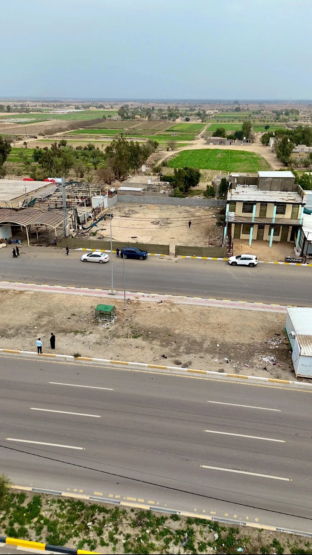 Aerial view of the Mawkib 713 plot near the Najaf–Karbala road.